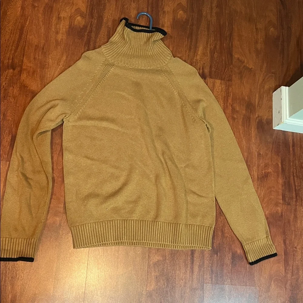 size medium banana republic tan turtle neck sweater with black details